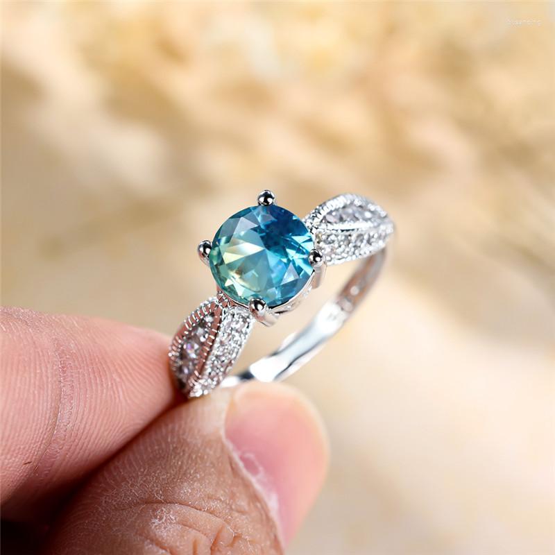 Wedding Rings Blue Green Zircon Engagement Ring Luxury Crystal Round Stone Dainty Silver Color Bridal For Women Men Jewelry
Wedding Rings Blue Green Zircon Engagement Ring Luxury Crystal Round Stone Dainty Silver Color Bridal For Women Men Jewelry