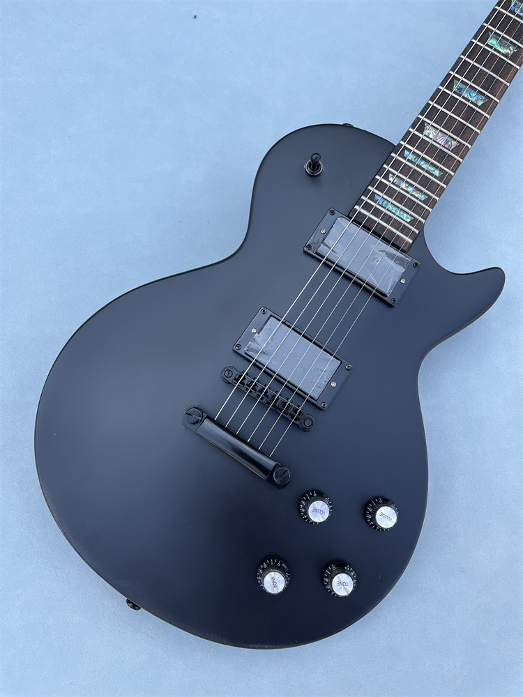 Custom Electric guitar ,Matte black color.Mahogany body gitaar rosewood fingerboard Black color hardware
Custom Electric guitar ,Matte black color.Mahogany body gitaar rosewood fingerboard Black color hardware