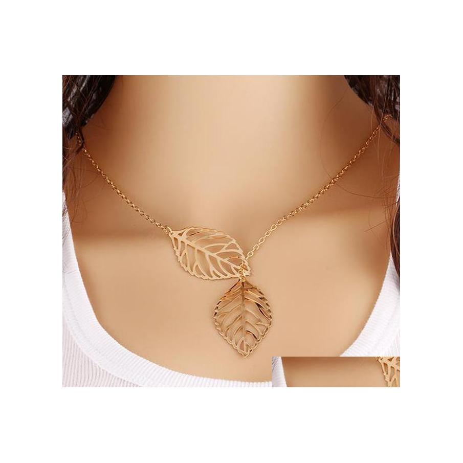Pendant Necklaces Fashion Simple 2 Pieces Leaves Choker Necklace Women Gold Sier Plated Hollow Charm For Ladies Jewelry Gift Drop De Otjiw
Pendant Necklaces Fashion Simple 2 Pieces Leaves Choker Necklace Women Gold Sier Plated Hollow Charm For Ladies Jewelry Gift Drop De Otjiw