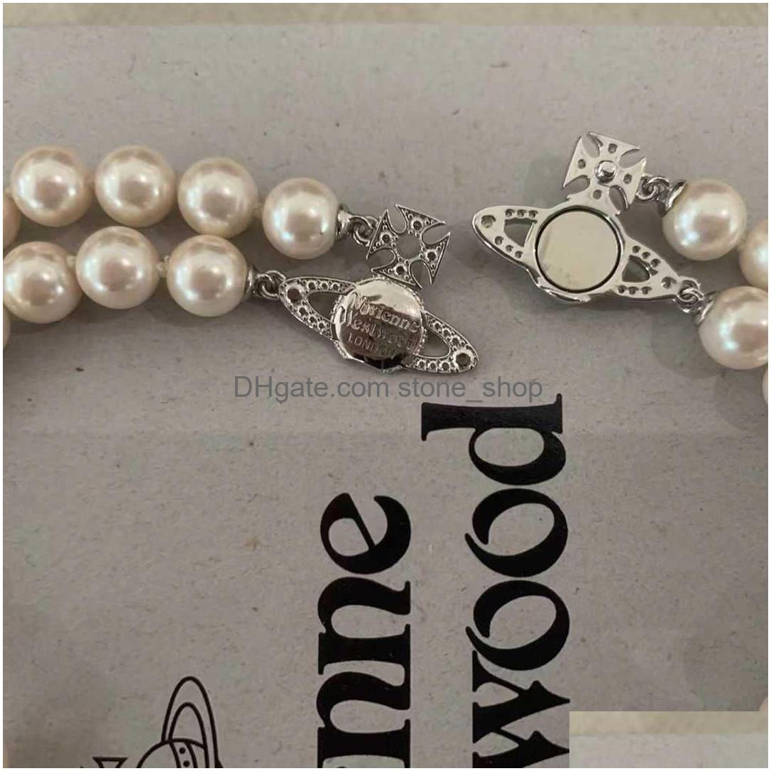 Pendant Necklaces Spot Vivian Westwood Counter Authentic Gold Sier Mens And Womens Classic West Queen Mother Necklace Drop Delivery Dhdv5
Pendant Necklaces Spot Vivian Westwood Counter Authentic Gold Sier Mens And Womens Classic West Queen Mother Necklace Drop Delivery Dhdv5