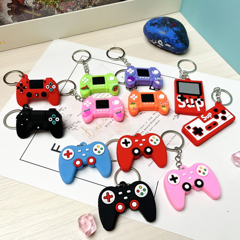 5099# Soft Glue Gaming handle Keychain Simulation Gaming Handle Car Student School Bag pendant Hanging Ornament Gift
5099# Soft Glue Gaming handle Keychain Simulation Gaming Handle Car Student School Bag pendant Hanging Ornament Gift