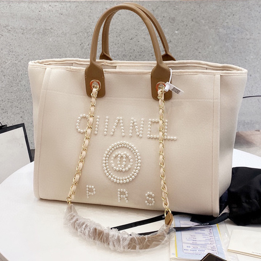 Evening Bags Designer Bag 2023 Handbag CC Metal Chain Pearl Beach bag Clutch Shoulder Crossbody Bag Lady Luxury bags, Customize
Evening Bags Designer Bag 2023 Handbag CC Metal Chain Pearl Beach bag Clutch Shoulder Crossbody Bag Lady Luxury bags, Customize