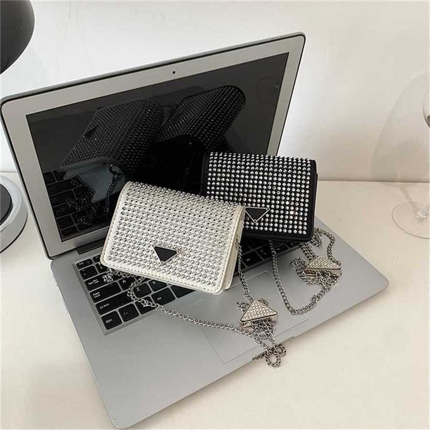 28% OFF Handbag High quality 2023 new bag Niche mini Rhinestone waist women's red Shoulder Messenger chain triangle, White8 
28% OFF Handbag High quality 2023 new bag Niche mini Rhinestone waist women's red Shoulder Messenger chain triangle, White8