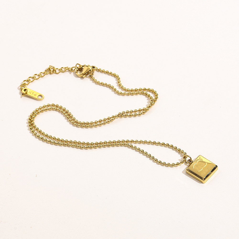 Luxury Design Necklace 14K Gold Plated Stainless Steel Necklaces Choker Beads Chain Letter Pendant Fashion Womens Wedding Jewelry Accessories Love Gifts M1199
Luxury Design Necklace 14K Gold Plated Stainless Steel Necklaces Choker Beads Chain Letter Pendant Fashion Womens Wedding Jewelry Accessories Love Gifts M1199