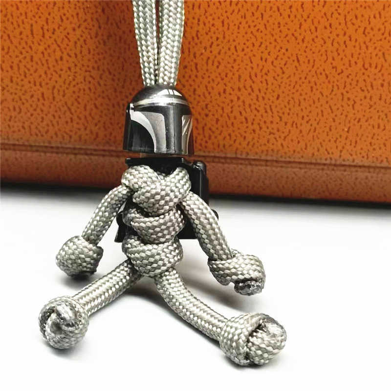 Key Rings Anime Building block Keychain Super Hero Biker Helmet Pendant Keychain Braided Rope Paracord Buddy Bag Hanging Backpack Doll Toy G230210