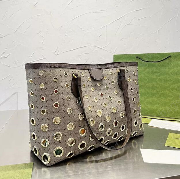 Casual Tote designer handbag clutch luxury bag Large Capacity shopping computer Bag leather Circular Metal Ring Letters Floral Print Fashion Totes sac a main femme, Brown
Casual Tote designer handbag clutch luxury bag Large Capacity shopping computer Bag leather Circular Metal Ring Letters Floral Print Fashion Totes sac a main femme, Brown