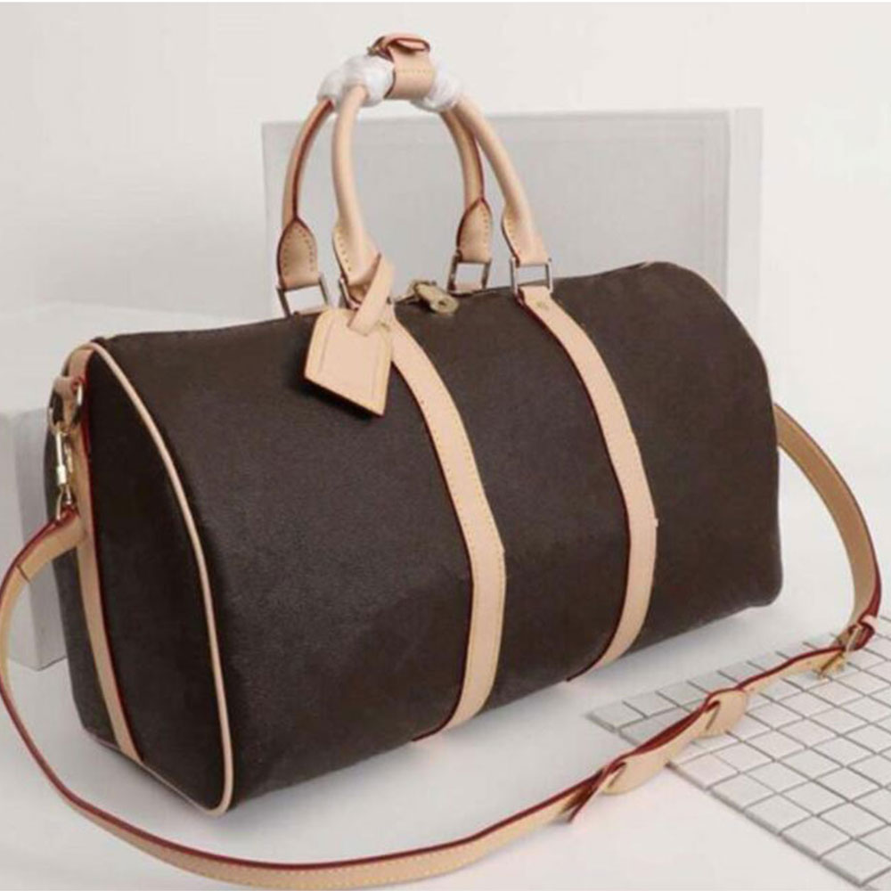 Fashion women travel bag large capacity good quality Leather Designer men shoulder duffel bags on luggage bottom rivets with lock head Luxury handbags, Brown flower
Fashion women travel bag large capacity good quality Leather Designer men shoulder duffel bags on luggage bottom rivets with lock head Luxury handbags, Brown flower