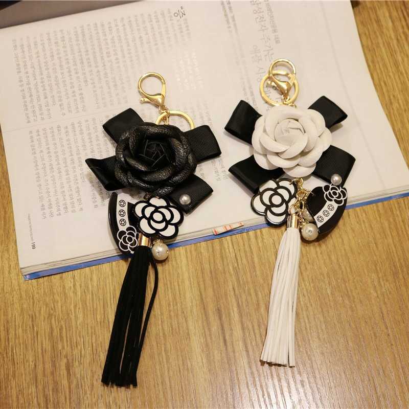 Key Rings Korean Version Of PU Leather Tassel Keychain Camellia Bag Pendant Car Key Ring Mobile Phone Shell Decoration G230210