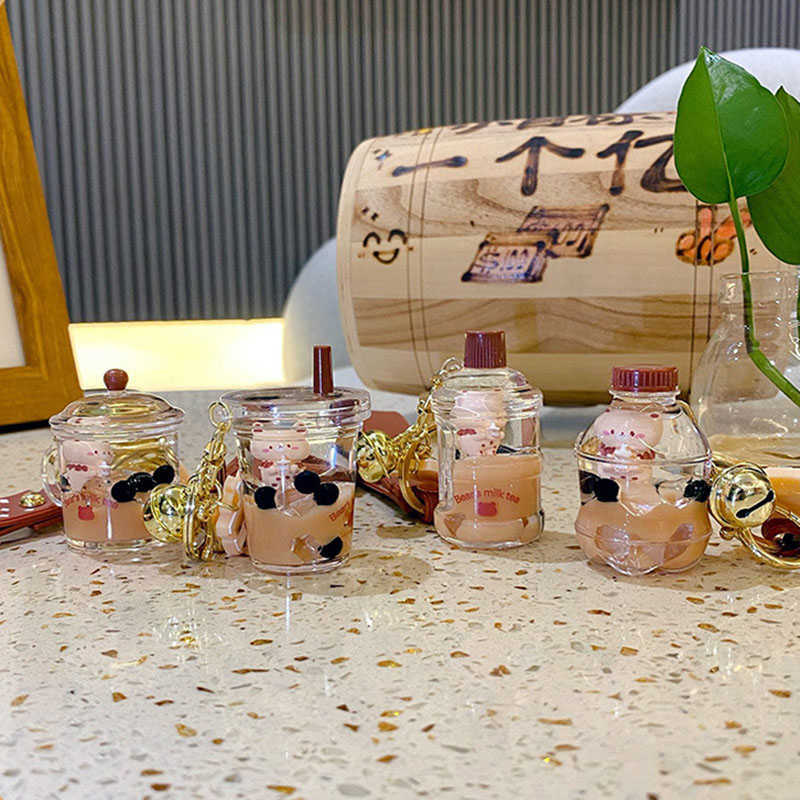 Key Rings Cartoon Into Oild Pearl Milk Tea Bear Floating Liquid Keychain For Girl Bag Pendant Cute Mug Drink Bottle Keyring Key Charm Gift G230210