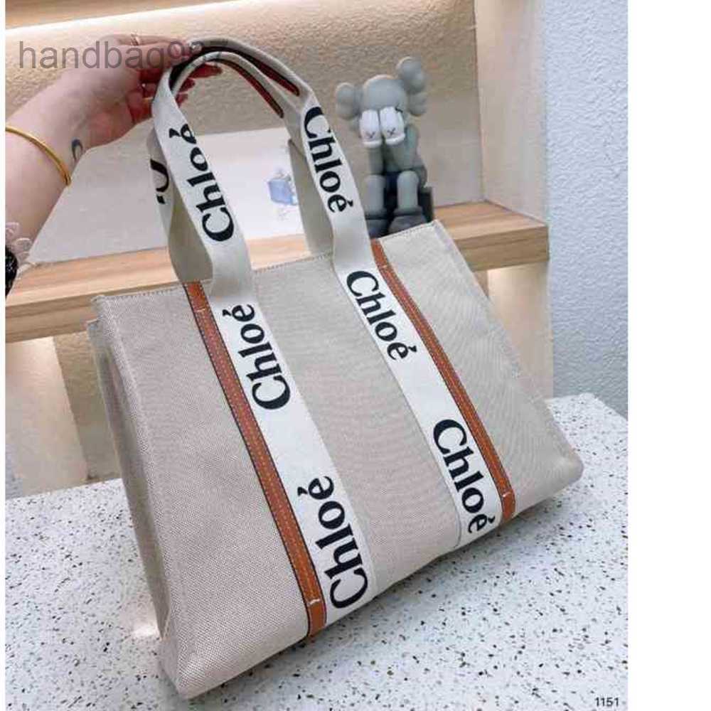 2023 Cloe Tote Bag Designer Bags Woody Handbag Fashion Beach One Shoulder Canvas Niche Design Portable Large Tote Women's Capacity GVFM
2023 Cloe Tote Bag Designer Bags Woody Handbag Fashion Beach One Shoulder Canvas Niche Design Portable Large Tote Women's Capacity GVFM