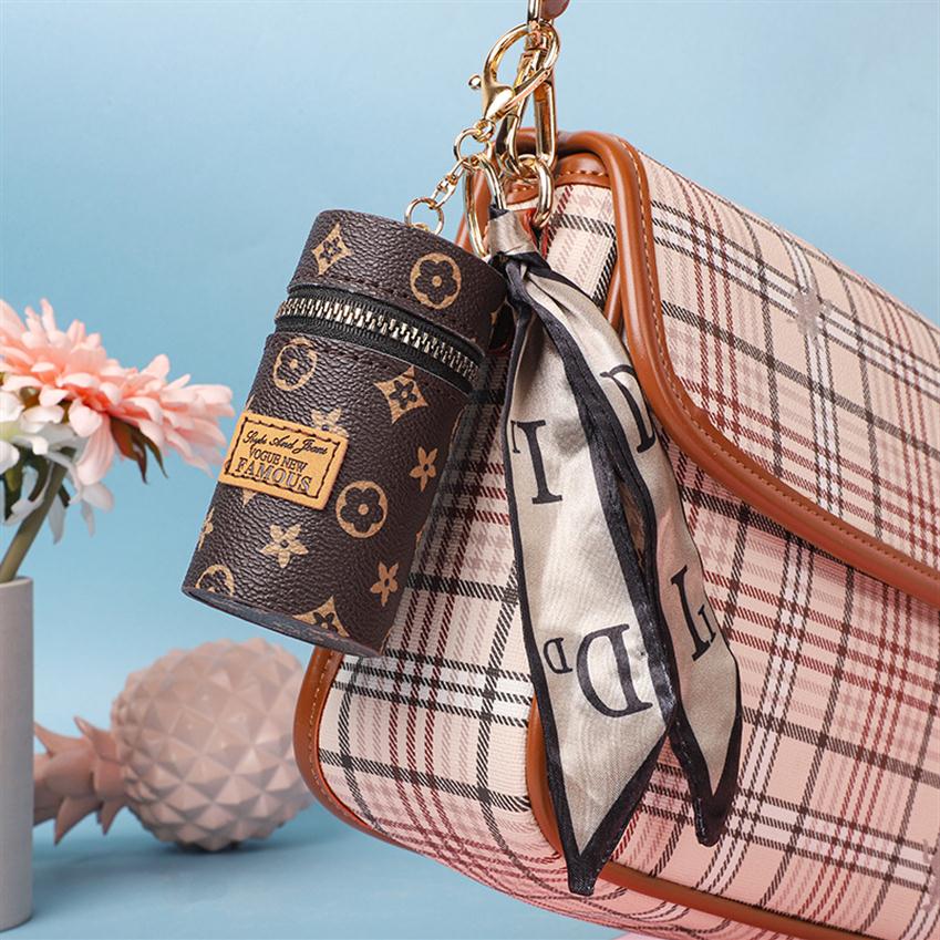 5pcs Purse bags Lipstick Organizer Leather Lip Gloss Holder Storage with Keychain Girls travel Lipgloss Makeup Case for Purse Perfume 298Z, Dark brown
5pcs Purse bags Lipstick Organizer Leather Lip Gloss Holder Storage with Keychain Girls travel Lipgloss Makeup Case for Purse Perfume 298Z, Dark brown