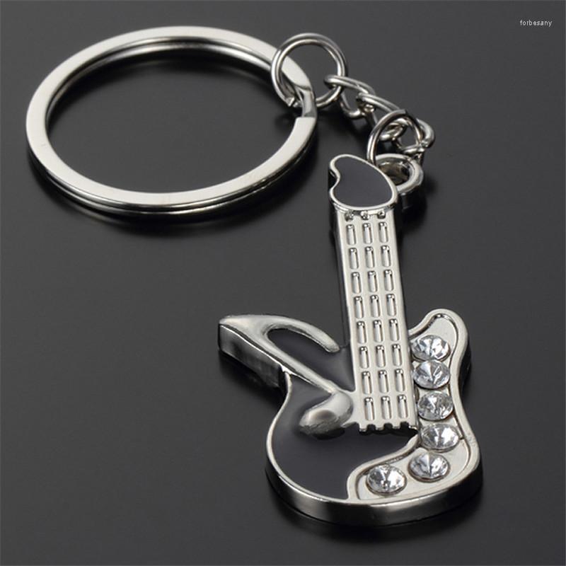 Keychains Fashion Simple Mini Metal Guitar Keychain For Men Women Personality Cute Bag Pendant Car Friend Couple Gift Jewelry
Keychains Fashion Simple Mini Metal Guitar Keychain For Men Women Personality Cute Bag Pendant Car Friend Couple Gift Jewelry