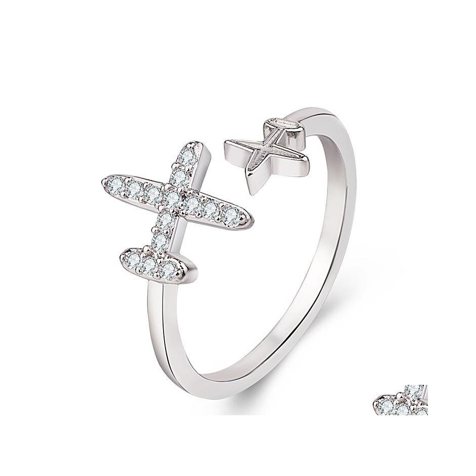 With Side Stones Sier Ring For Women Clear Cz Adjustable Rings Fine Jewelry Flying Plane Open Finger Drop Delivery Dhndz
With Side Stones Sier Ring For Women Clear Cz Adjustable Rings Fine Jewelry Flying Plane Open Finger Drop Delivery Dhndz