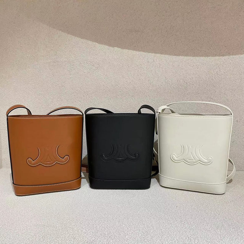 Fashion luxurys designer bag leather handbag triomphe bucket bag Exquisite and small package tote bag casual women's Shoulder Cross body bags, White
Fashion luxurys designer bag leather handbag triomphe bucket bag Exquisite and small package tote bag casual women's Shoulder Cross body bags, White