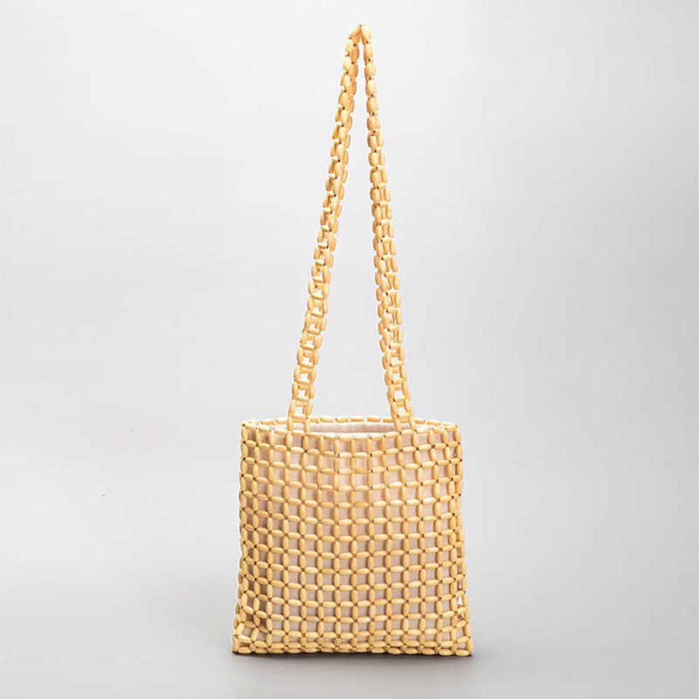 Fashion Hollow Wooden Beading Crossbody Bags Designer Women Shoulder Handmade Retro Casual Summer Beach Small Tote 2023 230129, Brown
Fashion Hollow Wooden Beading Crossbody Bags Designer Women Shoulder Handmade Retro Casual Summer Beach Small Tote 2023 230129, Brown