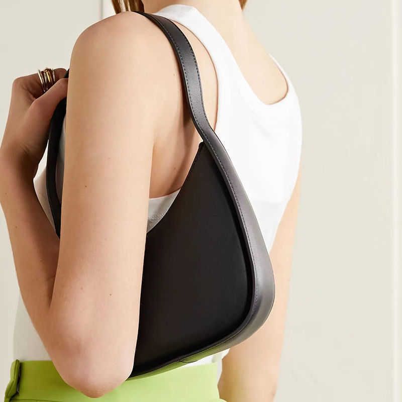 handbags Evening Bags The half moon bag half moon designed by the minority is very simple the underarm hand bag