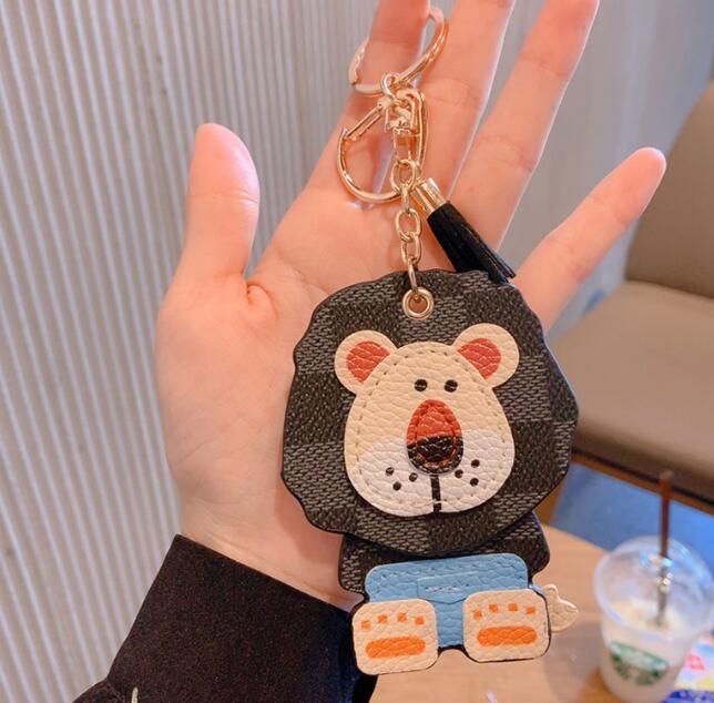 Cute Lion Coin Purse Keychain Pendant Charm Keyring Holder Fashion PU Leather Flower Grid Designer Metal Key Chain
Cute Lion Coin Purse Keychain Pendant Charm Keyring Holder Fashion PU Leather Flower Grid Designer Metal Key Chain