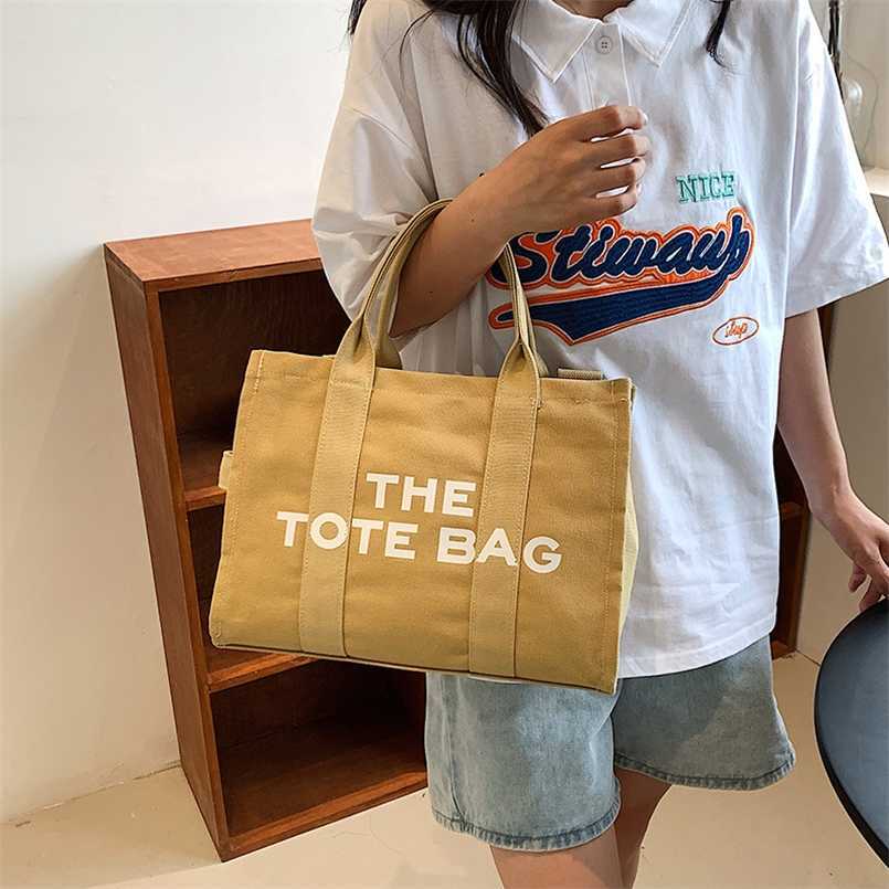 New style simple portable shoulder bag large capacity personalized letter Tote bag casual canvas diagonal span bag female, Yellow11
New style simple portable shoulder bag large capacity personalized letter Tote bag casual canvas diagonal span bag female, Yellow11