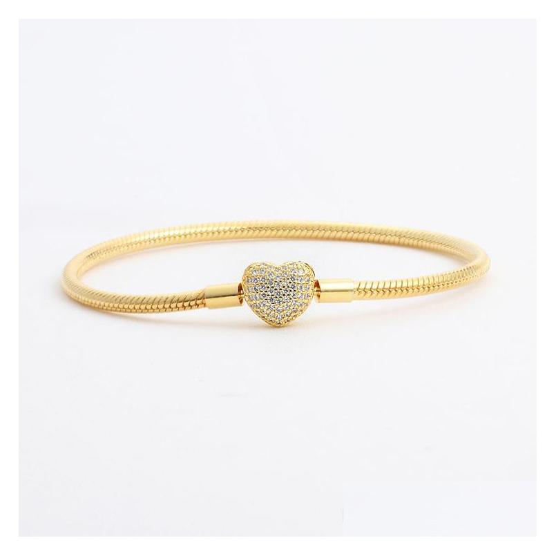 Charm Bracelets 18K Yellow Gold Plated Cz Diamond Heart Original Box Set For Pandora 925 Sier Snake Chain Bracelet Women Dro Dhd7M 
Charm Bracelets 18K Yellow Gold Plated Cz Diamond Heart Original Box Set For Pandora 925 Sier Snake Chain Bracelet Women Dro Dhd7M