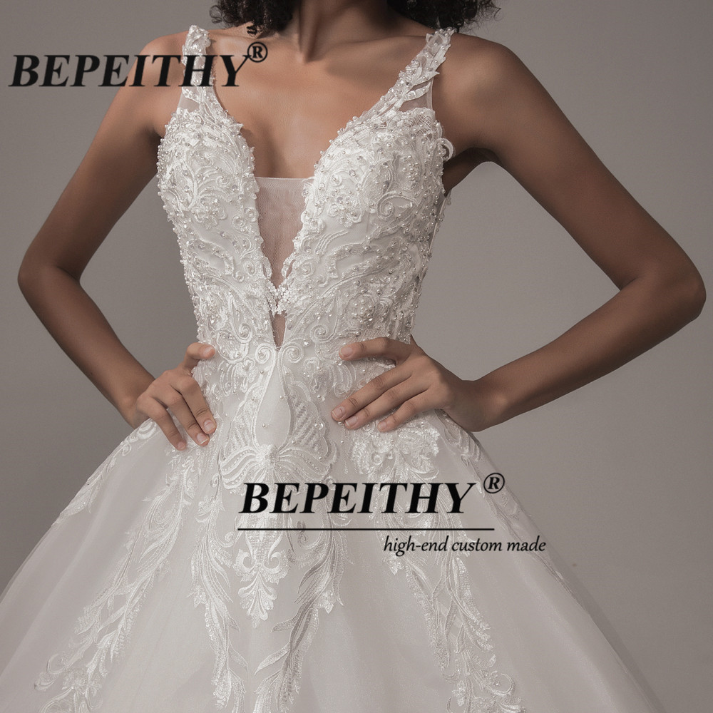 Party Dresses BEPEITHY Deep V Neck Lace Wedding Dress ForWomen Princess Bridal Court Train Sleeveless Indian Ivory Wedding Bouquet Dress 230217