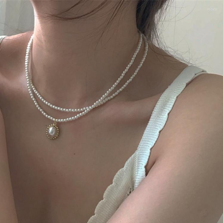 Pendant Necklaces Women's Korean Fashion Trendy Double Layer Chains Charm Pearl Necklace Exquisite Neck Chain Vintage Jewelry
Pendant Necklaces Women's Korean Fashion Trendy Double Layer Chains Charm Pearl Necklace Exquisite Neck Chain Vintage Jewelry