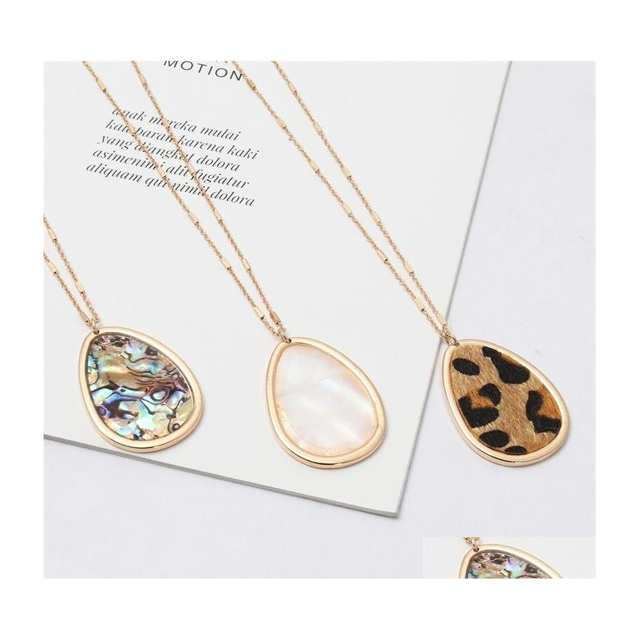 Pendant Necklaces Designer Waterdrop Abalone Shell Leopard Necklace Metal Long Chain Sweater Geometric Jewelry Drop Delivery Pendants Dhau1
Pendant Necklaces Designer Waterdrop Abalone Shell Leopard Necklace Metal Long Chain Sweater Geometric Jewelry Drop Delivery Pendants Dhau1