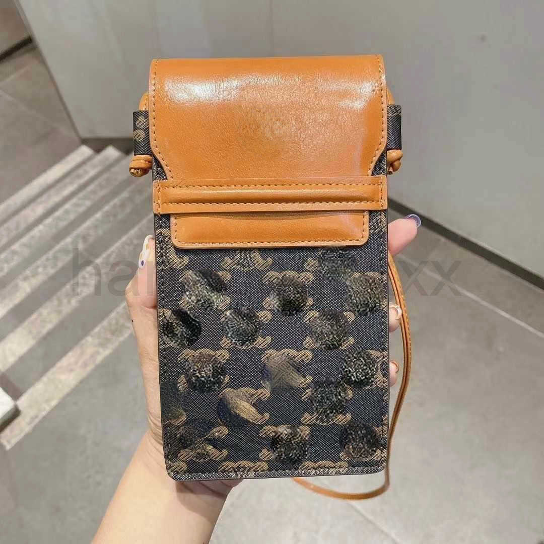 European and American big brand small bag cross messenger mobile phone card change general high-end atmosphere fashion, Black
European and American big brand small bag cross messenger mobile phone card change general high-end atmosphere fashion, Black