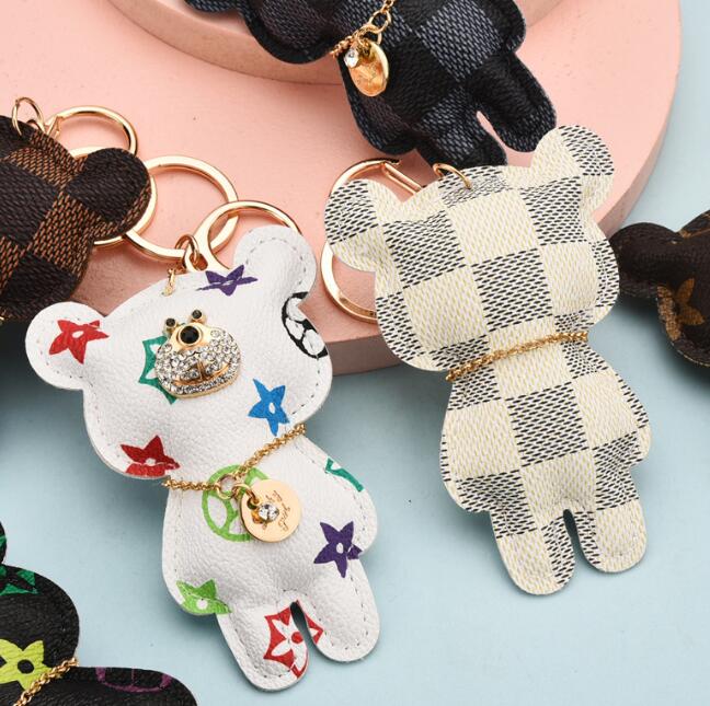 Fashion Bear Diamond Design Car Keychain Favor Flower Bag Pendant Charm Jewelry Keyring Holder for Men Gift PU Leather Keychains
Fashion Bear Diamond Design Car Keychain Favor Flower Bag Pendant Charm Jewelry Keyring Holder for Men Gift PU Leather Keychains