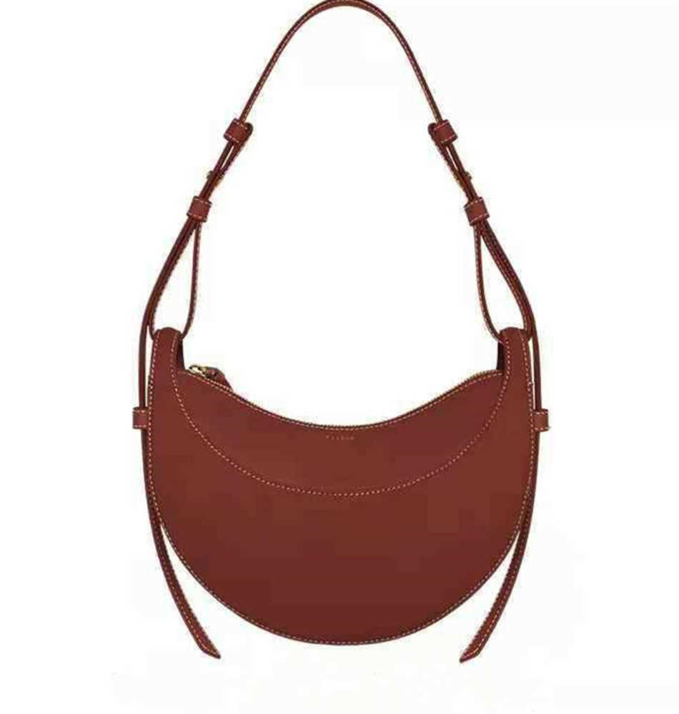 Briefcases French Polene Paris Niche Design Bag Single Shoulder Messenger Crescent Female Leather Armpit Saddle beatiuful
Briefcases French Polene Paris Niche Design Bag Single Shoulder Messenger Crescent Female Leather Armpit Saddle beatiuful