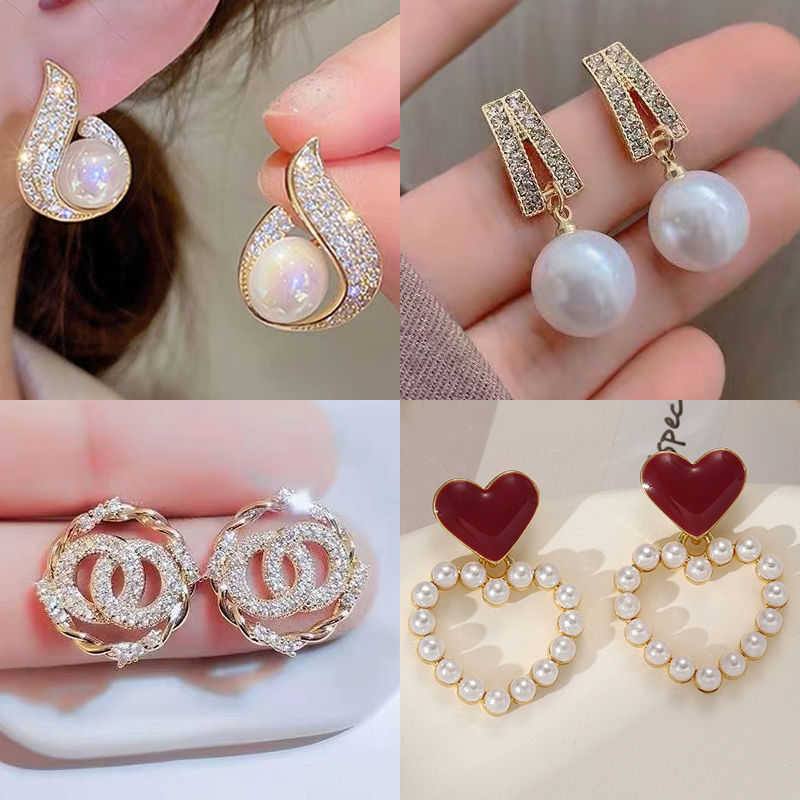 Charm S925 silver needle for women 2023 new fashion trend temperament advanced sense simple pearl earrings
Charm S925 silver needle for women 2023 new fashion trend temperament advanced sense simple pearl earrings