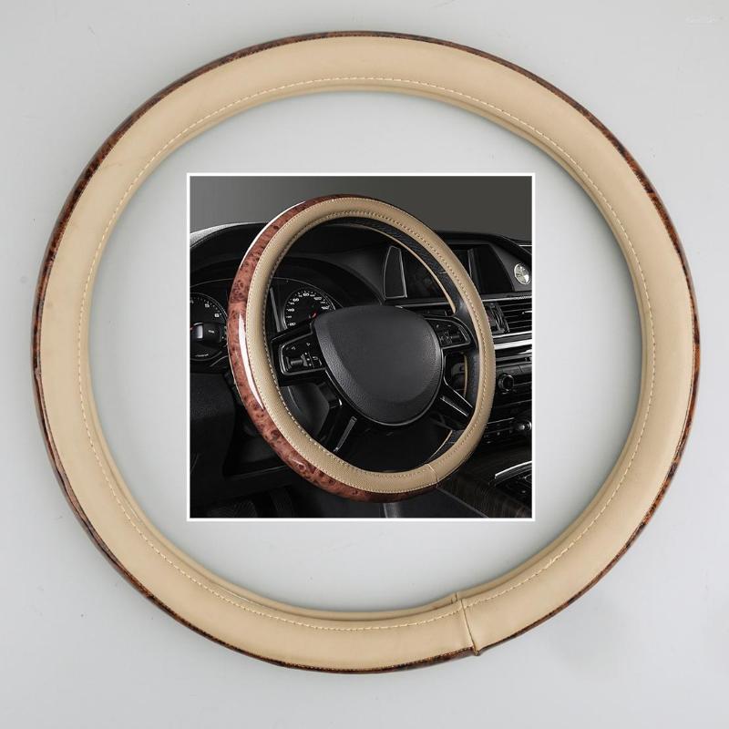 Steering Wheel Covers 38cm 15inch Cover Protector Grip Trim Non-Slip Beige Wood Grain Look Fit For Car SUV Truck Artificial Leather
Steering Wheel Covers 38cm 15inch Cover Protector Grip Trim Non-Slip Beige Wood Grain Look Fit For Car SUV Truck Artificial Leather
