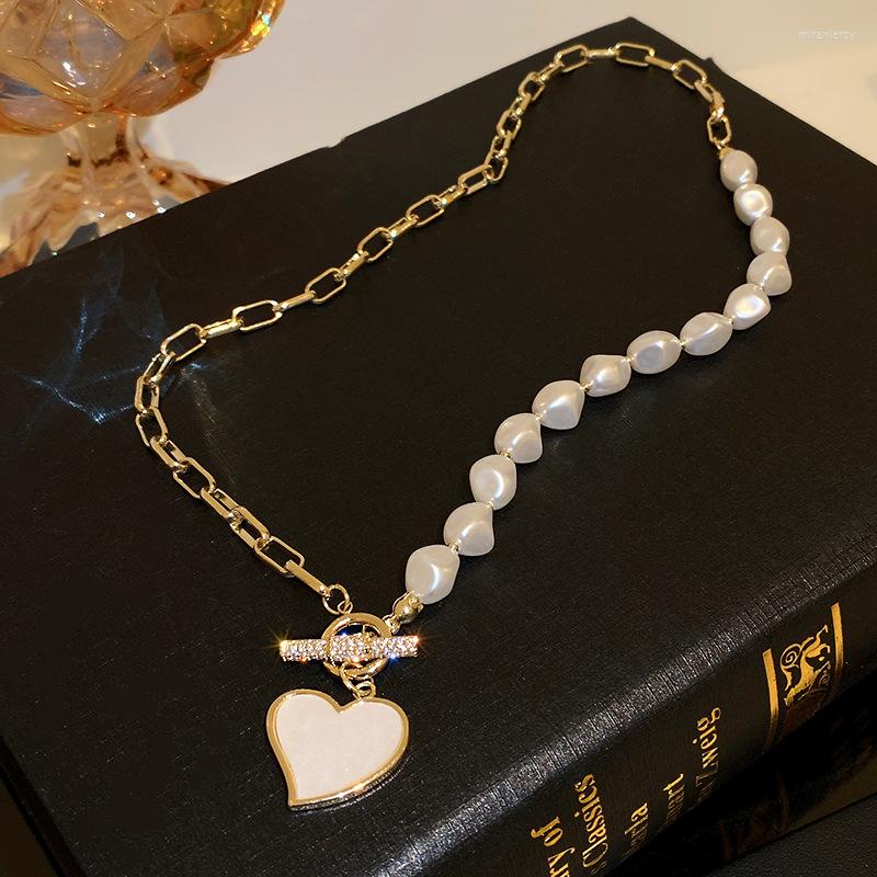 Pendant Necklaces Pearl Shell Heart Necklace For Women T-shaped Buckle Stitching Choker Fashion Jewelry Clavicle Chain Christmas Gifts
Pendant Necklaces Pearl Shell Heart Necklace For Women T-shaped Buckle Stitching Choker Fashion Jewelry Clavicle Chain Christmas Gifts