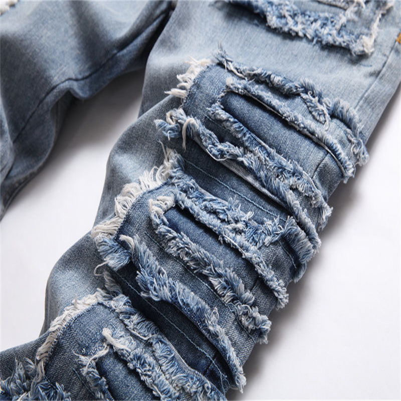 Foreign trade tides brand ripped stick cloth jeans men's Liuding slim small foot pants new Europe and the United States beggar pants