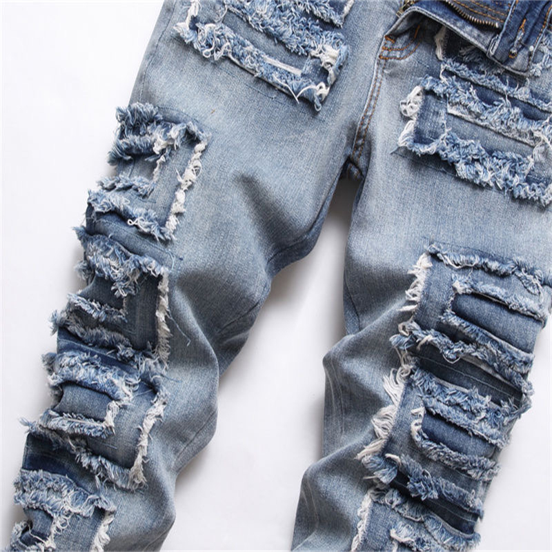 Foreign trade tides brand ripped stick cloth jeans men's Liuding slim small foot pants new Europe and the United States beggar pants