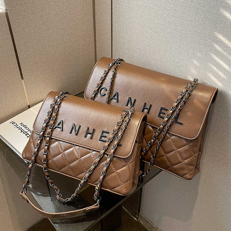handbag 2023 hand fashionable new shoulder Large capacity chain rhombus large fashion simple one-shoulder commuter messenger bag, Black large size
handbag 2023 hand fashionable new shoulder Large capacity chain rhombus large fashion simple one-shoulder commuter messenger bag, Black large size