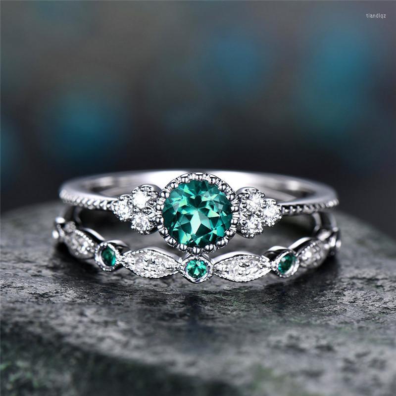 Cluster Rings White Gold Couple Zircon Ladies Set Round Emeraldgreen Crystal Double Layerd Wedding Ring Designer Luxury Jewelry
Cluster Rings White Gold Couple Zircon Ladies Set Round Emeraldgreen Crystal Double Layerd Wedding Ring Designer Luxury Jewelry