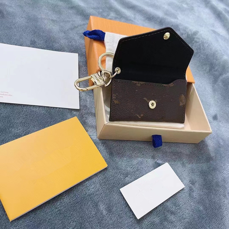 Luxury Designer Wallet Keychain Keyring Fashion Purse Pendant Car Chain Charm Old Flower Mini Bag Trinket Gifts No Box
Luxury Designer Wallet Keychain Keyring Fashion Purse Pendant Car Chain Charm Old Flower Mini Bag Trinket Gifts No Box