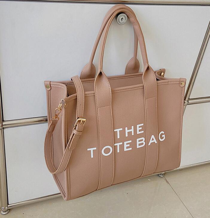 2023 New Marc Jocob Women TOTE BAG letter PU Leather bag diagonal handbag hand shopping bag M00185
2023 New Marc Jocob Women TOTE BAG letter PU Leather bag diagonal handbag hand shopping bag M00185