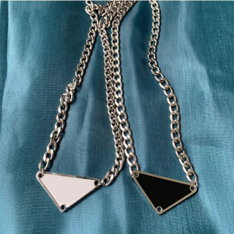 Black White Triangle Letter Pendant Necklace Luxury Brand Designer Statement Jewelry Titanium Steel Necklaces Chain Men Women Unisex Gift 2Style
Black White Triangle Letter Pendant Necklace Luxury Brand Designer Statement Jewelry Titanium Steel Necklaces Chain Men Women Unisex Gift 2Style