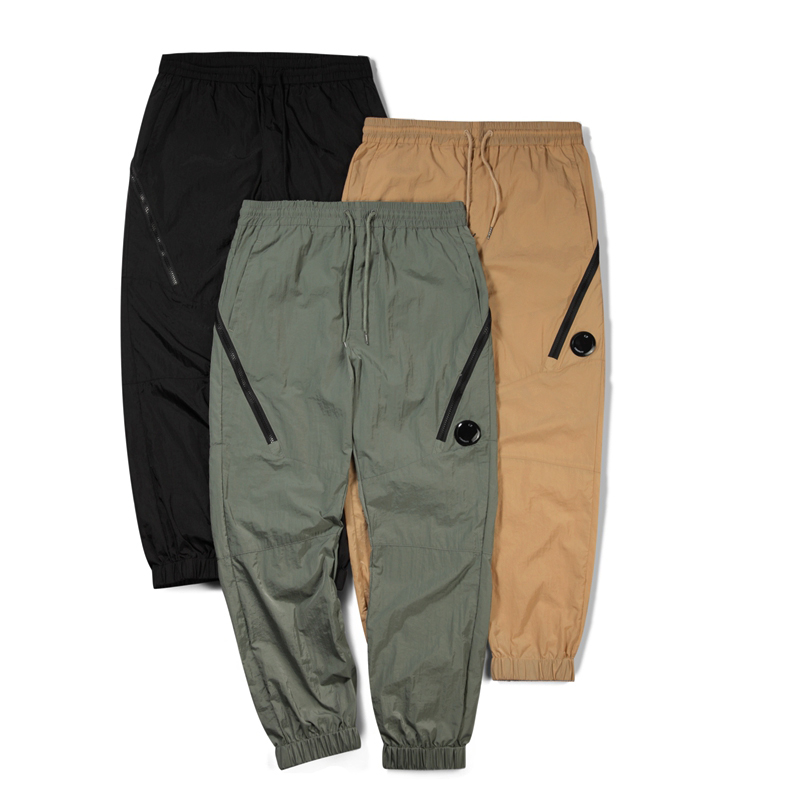 

Metal nylon men pants one lens logo zipper pocket male pant outdoor tracksuit casual jogging trousers black size M-XXL CP, Khaki