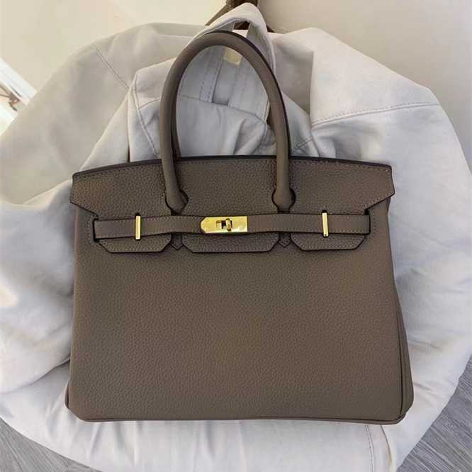 Herms Birkin Bags Fashionable and popular litchi grain leather classic bag highclass highcapacity singleshoulder diagonal portable, Khaki
Herms Birkin Bags Fashionable and popular litchi grain leather classic bag highclass highcapacity singleshoulder diagonal portable, Khaki