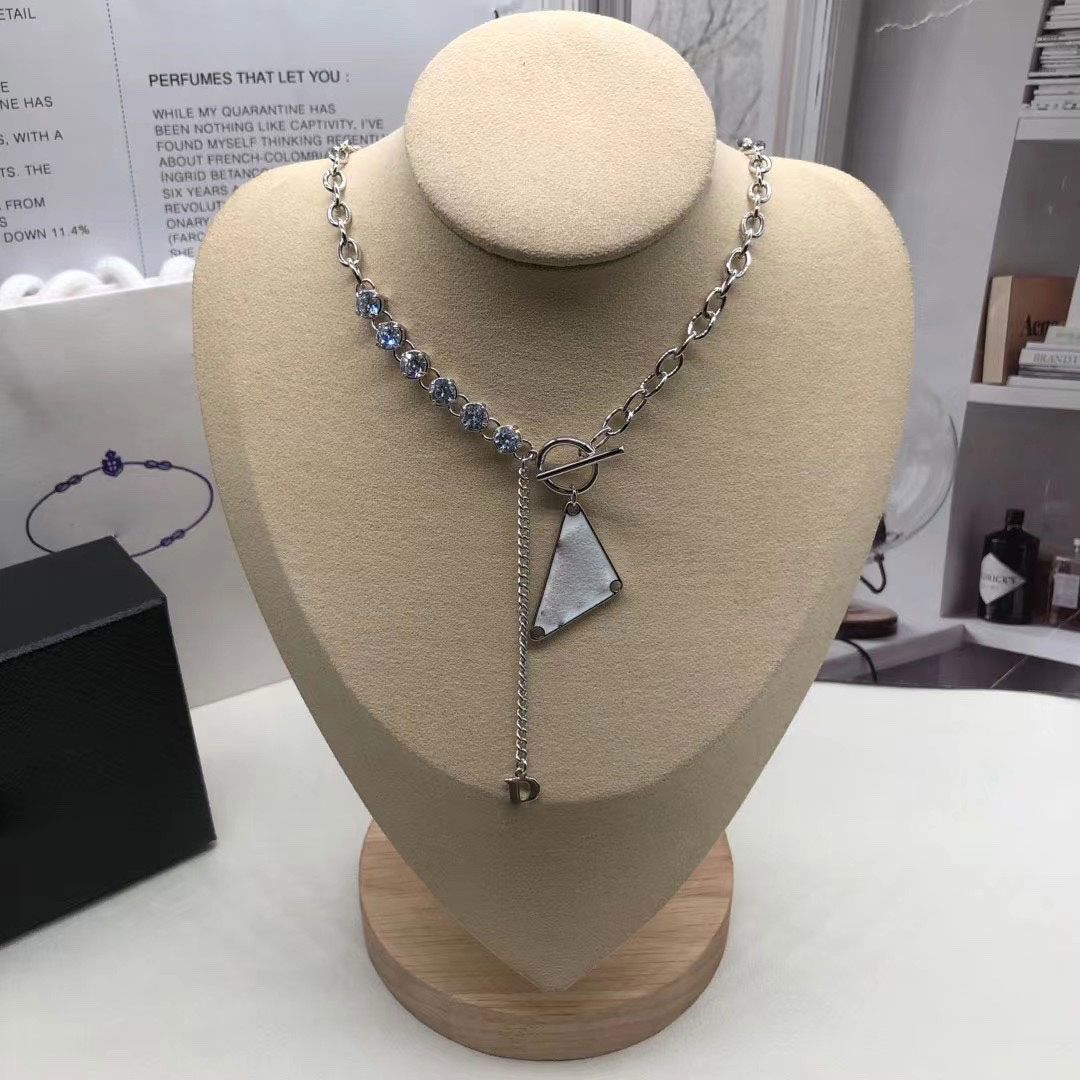 2023New fashion women's letter inverted triangle pendant advanced design sense necklace men and women trend niche cool girl hip-hop simple design necklace
2023New fashion women's letter inverted triangle pendant advanced design sense necklace men and women trend niche cool girl hip-hop simple design necklace
