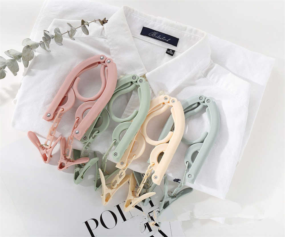 Hangers Racks Multi-functional Plastic Clothes Hanger Travel Space Saving Foldable Hanger Creative Clothes Rack Children Baby Hanger T230224
Hangers Racks Multi-functional Plastic Clothes Hanger Travel Space Saving Foldable Hanger Creative Clothes Rack Children Baby Hanger T230224