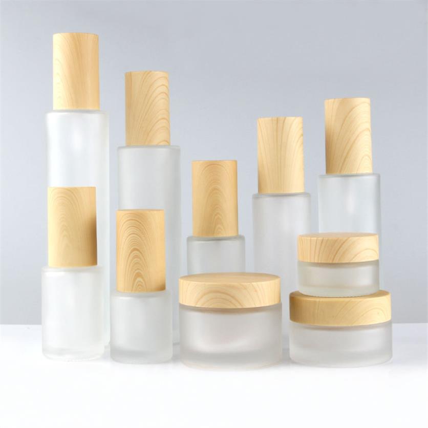 10pcs Elegant Frosted Clear Glass Lotion Pump Spray Bottle With Wood grain cover High Grade Facial Cream Jar DIY Makeup Tool331L
10pcs Elegant Frosted Clear Glass Lotion Pump Spray Bottle With Wood grain cover High Grade Facial Cream Jar DIY Makeup Tool331L