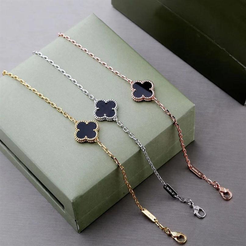 luxury clover designer charm bracelets for girls women 18K gold silver black white red green shell brand bracelet necklace wedding part236Q
luxury clover designer charm bracelets for girls women 18K gold silver black white red green shell brand bracelet necklace wedding part236Q