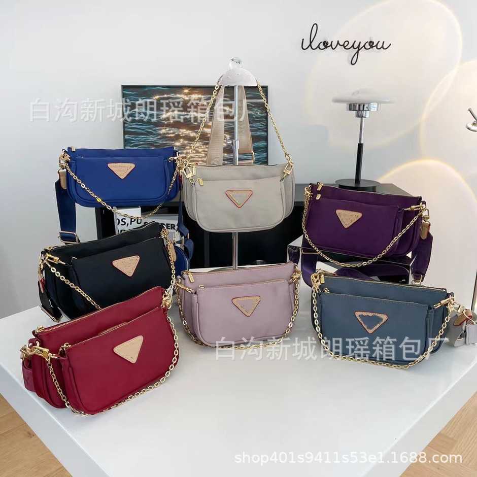 2023 New Luxury High Quality Fashion Bag Women's Nylon Three in One Shoulder Diagonal Small Square Versatile Chain BagHigh, Black11
2023 New Luxury High Quality Fashion Bag Women's Nylon Three in One Shoulder Diagonal Small Square Versatile Chain BagHigh, Black11