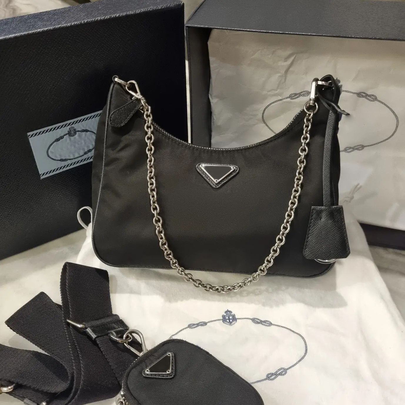 Triangle Re-Edition 2000 2005 nylon chain designer Saffiano bag womens mens prad cleo hand bag luxury purse crossbody Shoulder messenger tote bag bucket mini wallet, 1-black
Triangle Re-Edition 2000 2005 nylon chain designer Saffiano bag womens mens prad cleo hand bag luxury purse crossbody Shoulder messenger tote bag bucket mini wallet, 1-black