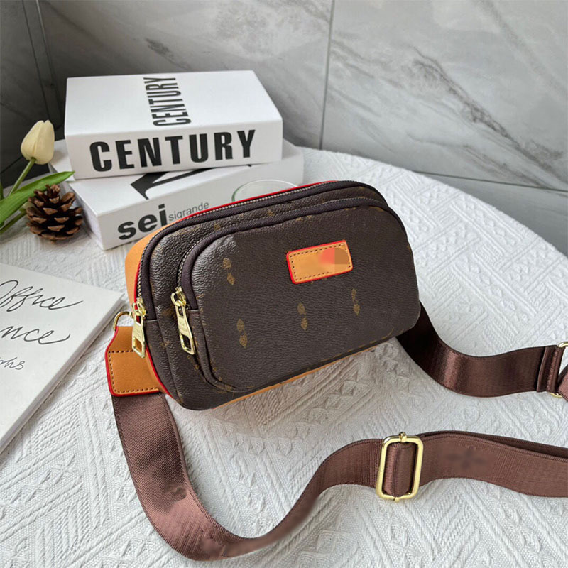 Luxury designer Camera bag Outdoor men and women Slung luggage bags wallet Classic fashion Fanny pack weekend bag, Leather
Luxury designer Camera bag Outdoor men and women Slung luggage bags wallet Classic fashion Fanny pack weekend bag, Leather