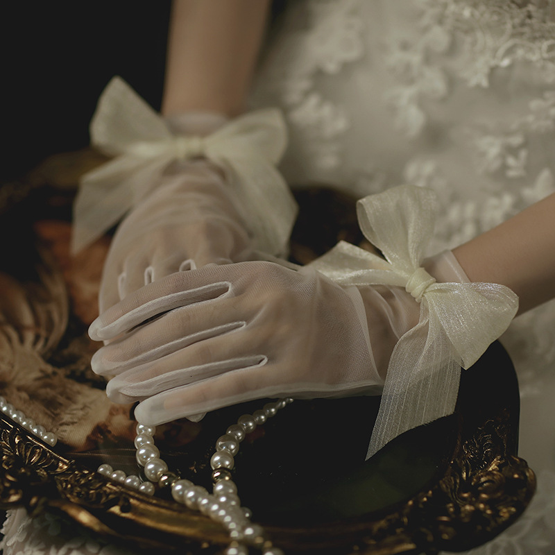 Five Fingers Gloves Lace Short Bridal bowknot Wristband Wedding Glove For Women Girl Party Evening Dress Jewelry Bride Accessories 230225
Five Fingers Gloves Lace Short Bridal bowknot Wristband Wedding Glove For Women Girl Party Evening Dress Jewelry Bride Accessories 230225