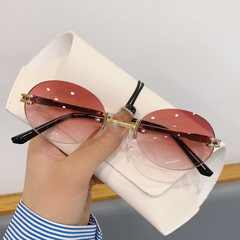 Sunglasses KAMMPT Vintage Oval Rimless Sunglasses for Women Fashion 2022 Punk Female Eyewear Shades Gradient UV400 Luxury Men Sun Glasses G230225
Sunglasses KAMMPT Vintage Oval Rimless Sunglasses for Women Fashion 2022 Punk Female Eyewear Shades Gradient UV400 Luxury Men Sun Glasses G230225